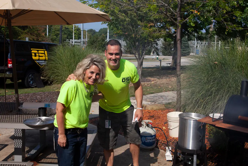 Man and woman at company picnic