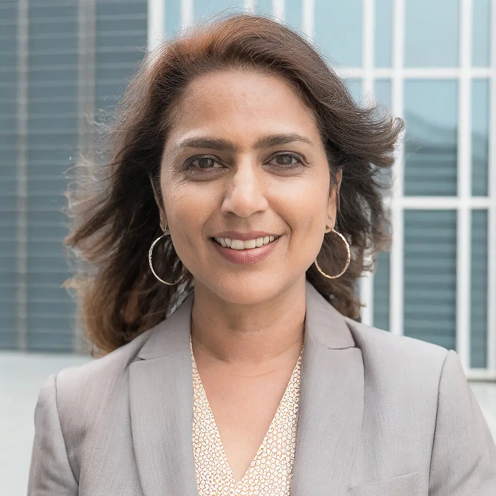 A portrait of a woman who is a Plastic Components & Assembly Category Manager.
