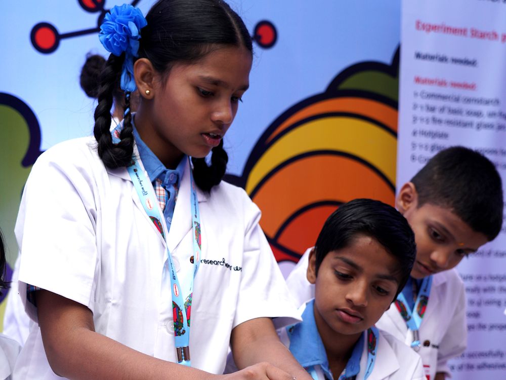 Henkel India Reasearchers World - Children learning about why glue sticks