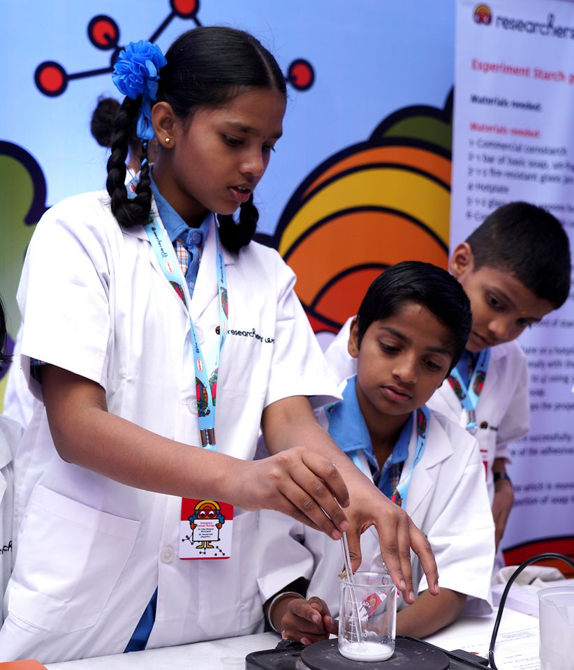 Henkel India Reasearchers World - Children learning about why glue sticks